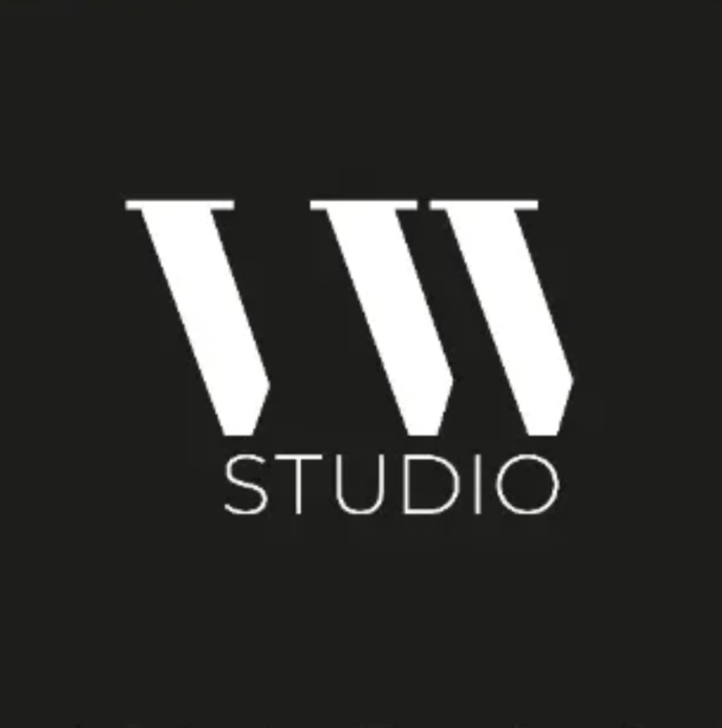 VW Studio white logo on a black background