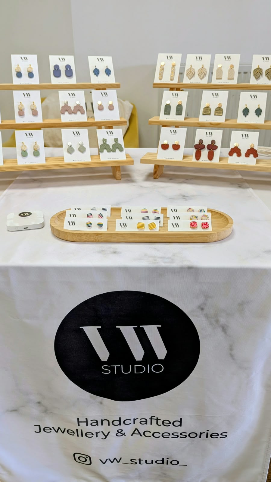VW Studio market stall displaying handcrafted jewellery and accessories
