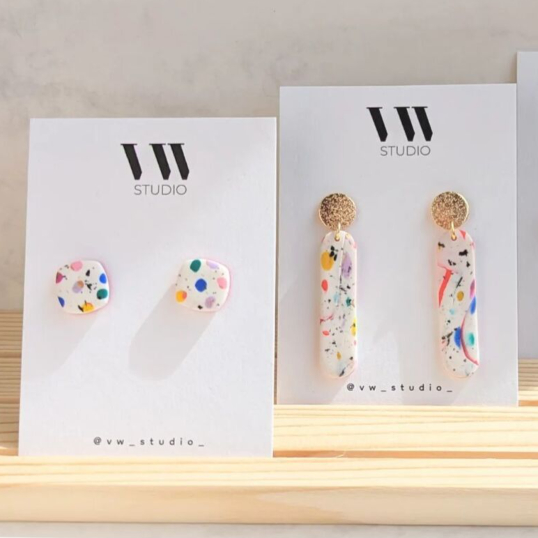 Floral patterned VW Studio earrings displayed on jewellery cards