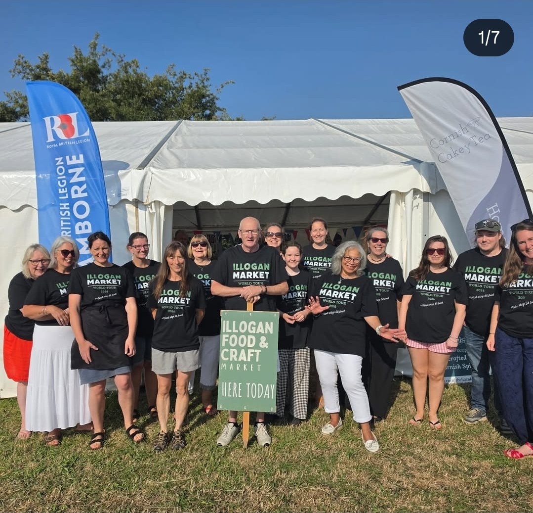 The Illogan Food & Craft Market team outside the marquee in their market t-shirts